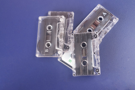 Old cassette with blue backgroundの写真素材