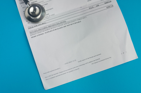Hospital Bills And stethoscopeの写真素材