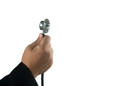 Hand holding stethoscope with isolated white backgroundの写真素材