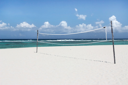 Volleyball net on beautiful tropical beachの写真素材