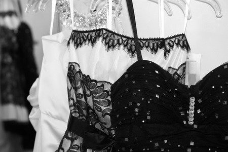 Dresses hanging in fitting roomの写真素材