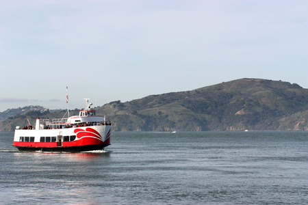 Boat with Passangers cruising on Pacific Ocean
