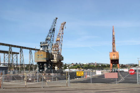High cranes on abandoned construction siteの写真素材