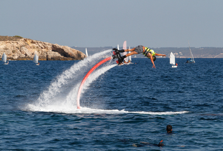 Palma de Mallorca, Spain - August 21, 2013 - Flyboarding in the Balearic Spanish island of Mallorcaのeditorial素材