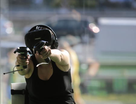 Barcelona, Spain - June 15, 2017 - A woman uses a virtual reality headset at Sonar advanced music...