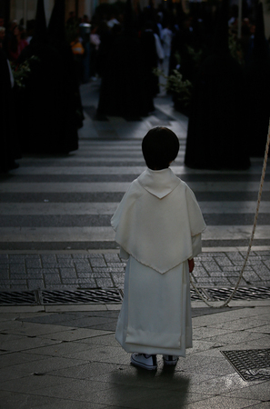 Palma de Mallorca, Spain - April 15 2019 - Penitents take part in the procession of Saint christ of Santa Cruz during easter holy week in the Spanish islandのeditorial素材