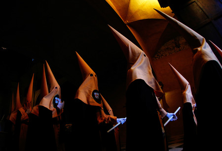 Palma de Mallorca, Spain - April 17 2019 - Penitents take part in the procession of Saint christ of...