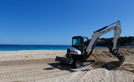 Magaluf beach, Mallorca / Spain - April 9, 2019: Magaluf beach view during spring season when touristic services finish their last winter maintenance works to start the summer seasonのeditorial素材