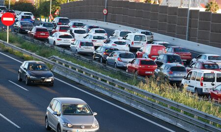 Palma de Mallorca, Spain / September 25, 2018: Heavy traffic on the main Palma city motorway, the arrival of floats of rental cars to supply the massive arrival of tourists to the island is bringing problems like jams or residential lacks to local residenのeditorial素材