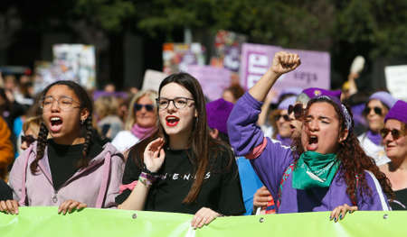 Palma de Mallorca / Spain - March 8, 2020: Women march wearing banners and shouting slogans during the Internationa Women Day (8th March) in Palma de Mallorca.のeditorial素材