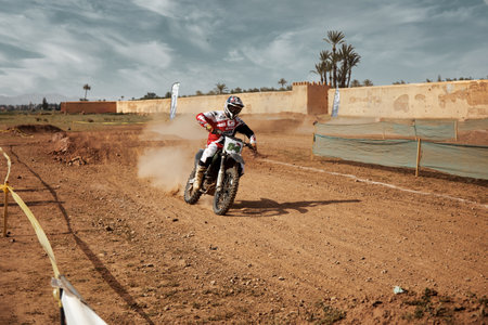 man play with his bike in the piste of race 1のeditorial素材