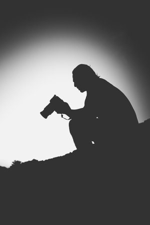 Silhouette of photographer in Street