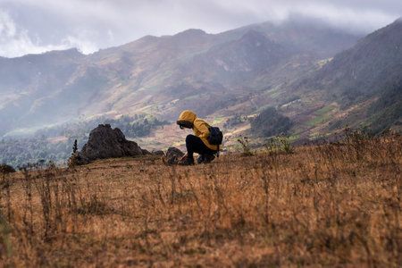 Woman hiker trekking in the highlands of Ethiopia, Africa