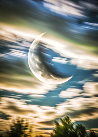 Crescent moon in the sky with clouds. Abstract nature background.