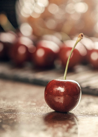 Cherries on a wooden table, selective focus, shallow DOFの写真素材
