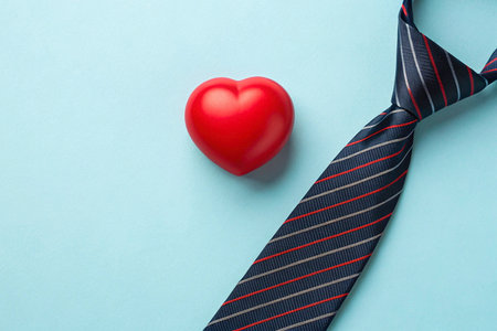 mockup Red heart and necktie on blue background, Valentine's day conceptの素材