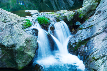 Flowing waterfallの写真素材