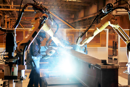 Workers at the Xuanhua Reza pumping plant in Futian, Beiqi, work on the production line.