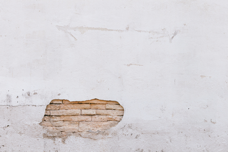 brick wall broken with white spaceの写真素材