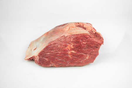 large piece of beef tenderloin, raw meat, isolated on whiteの写真素材