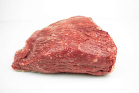 large piece of beef tenderloin, raw meat, isolated on whiteの写真素材
