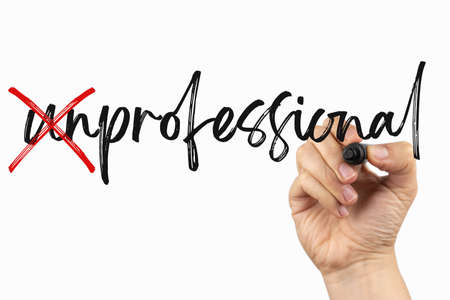 Ð¡rossed out letters to write professional. Doodle on a whiteboard, written with black and red marker in a hand. Scribble sketch text on a boardの写真素材