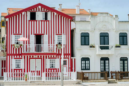 little cute striped houses in Costa Nova, Portugalの写真素材