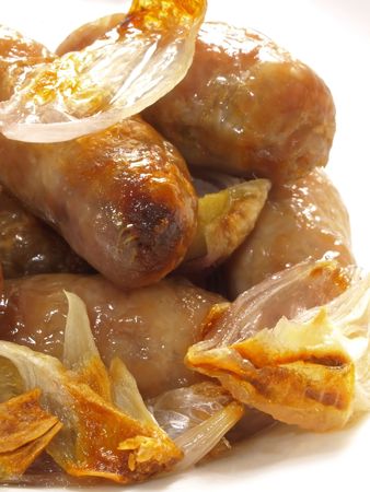 roasted sausages with onions    の写真素材