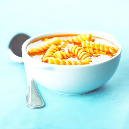 tomato soup with fusilli pastaの写真素材