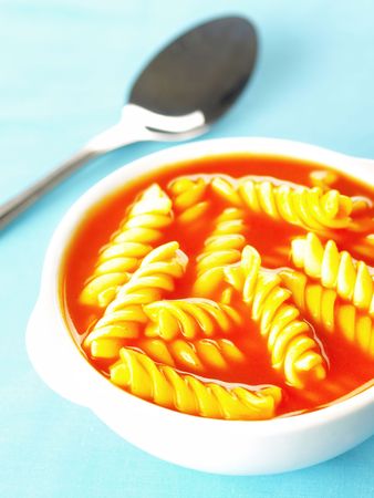 tomato soup with fusilli pastaの写真素材