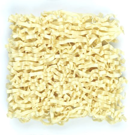 dried asian raw egg flat noodles の写真素材