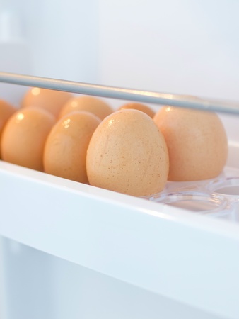 fresh chicken eggs in the fridgeの写真素材