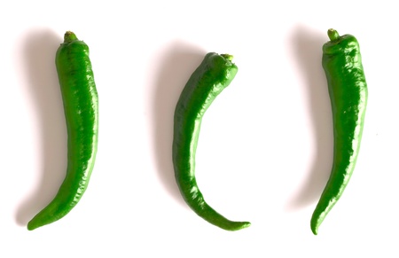 green chilies on whiteの写真素材