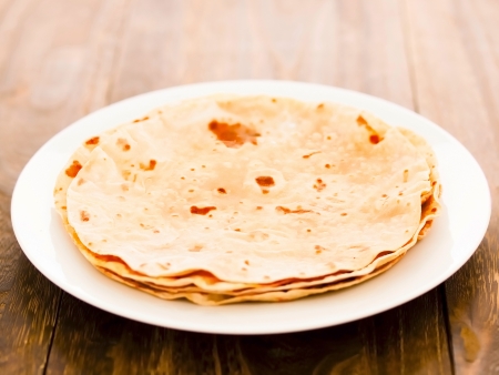 close up of a plate of indian chapati breadの写真素材