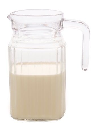 close  up of a jug of milk isolated on whiteの写真素材