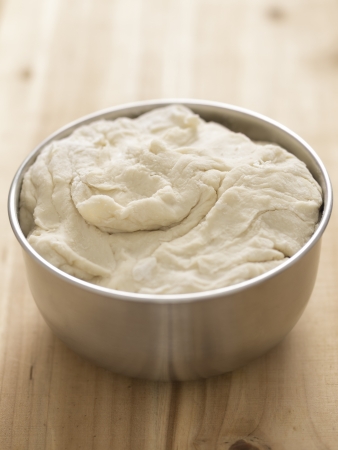 close up of a bowl of flour doughの写真素材