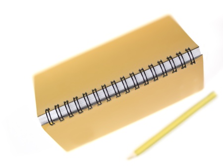 close up of a notepad isolated on white