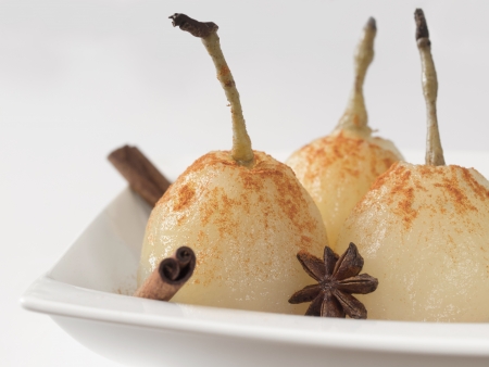 close up of a plate of poached pearsの写真素材