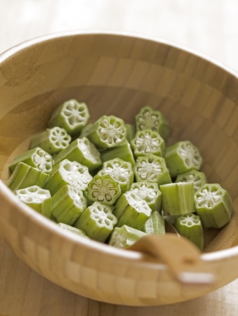 close up of a bowl of cut okraの写真素材