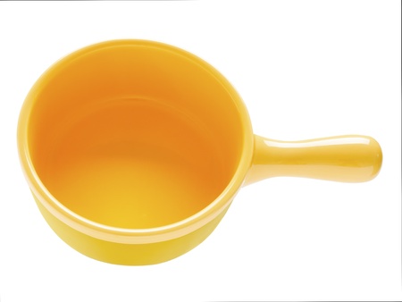 close up of a yellow ceramic clay pot isolatedの写真素材