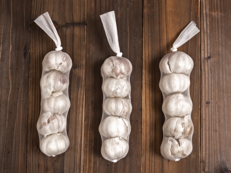 close up of garlic on wooden tableの写真素材