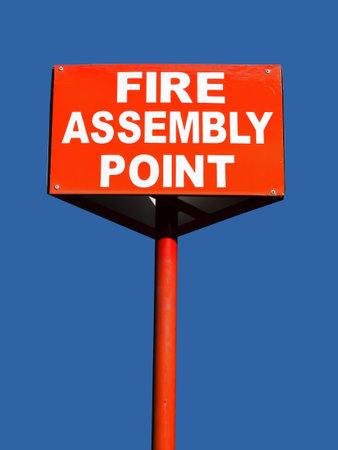 close up of a fire assembly point sign