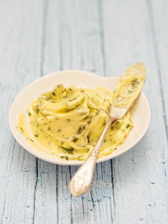close up of a plate of rustic herb butterの写真素材