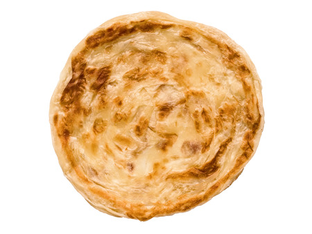 close up of an indian roti paratha fried pancake isolatedの写真素材