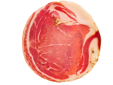 close up of italian pancetta bacon isolatedの写真素材