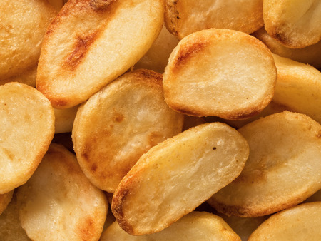 close up of crispy roasted potato food backgroundの写真素材