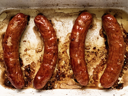 close up of rustic roasted sausageの写真素材