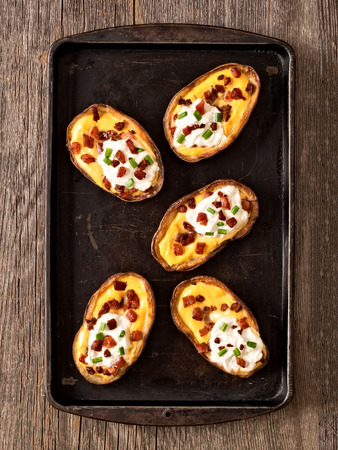 close up of rustic baked potato skinの写真素材