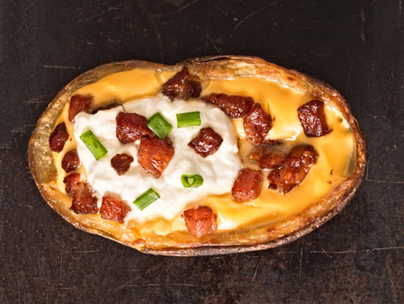 close up of rustic baked potato skinの写真素材