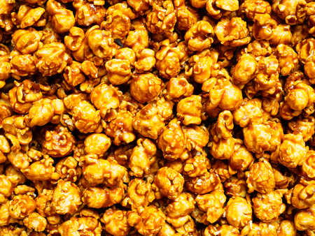 close up of salted caramel popcorn food backgroundの写真素材